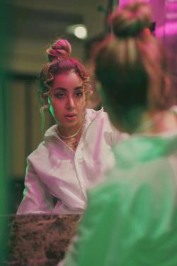 Fashion Portrait with Neon Glow in Elevator