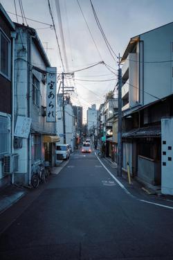 Explore the quiet streets of the Gion District in Kyoto, Japan, during the peaceful dusk hours.